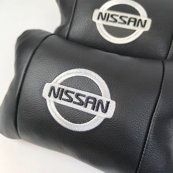 Подушки в авто 2 шт Nissan, натуральная кожа, с логотипом Ниссан, на подголовник для вашей машины ws85375 фото