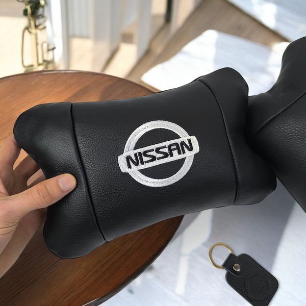 Подушки в авто 2 шт Nissan, натуральная кожа, с логотипом Ниссан, на подголовник для вашей машины ws85375 фото