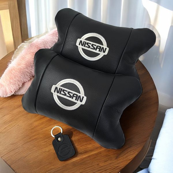 Подушки в авто 2 шт Nissan, натуральная кожа, с логотипом Ниссан, на подголовник для вашей машины ws85375 фото