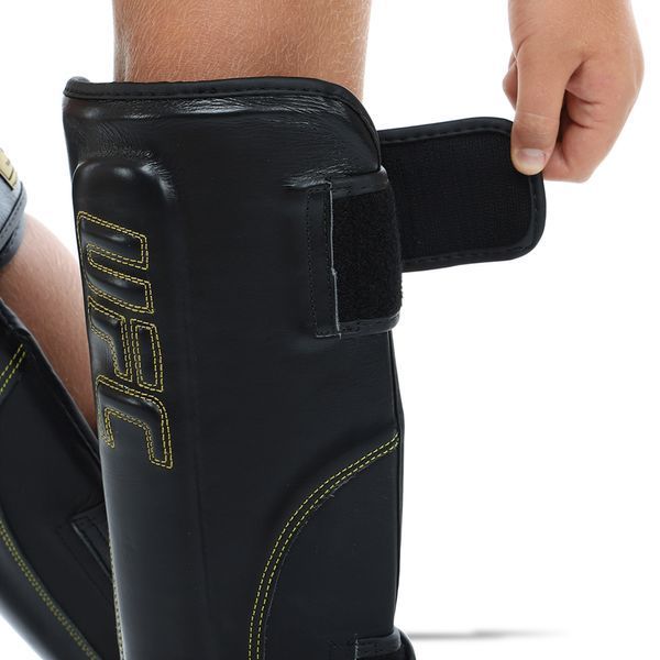 Защита голени и стопы Муай Тай, ММА, Кикбоксинг кожаная UFC PRO Prem Stand Up UHK-75052 S-M черный UHK-75052 фото