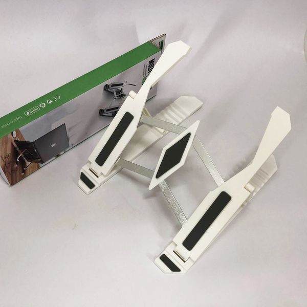 Подставка для ноутбука Multi-Position foldable bracket JC-25 8х22смСтильная подставка. Цвет: белый ws85551-1 фото