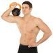 Гиря тренувальна цільна гумова з пофарбованою ручкою LiveUp Urethane competition kettlebell UAZE5336-12 вага 12кг чорний-помаранчевий UAZE5336-12 фото 10