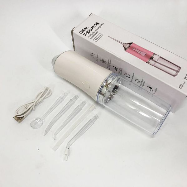Іригатор для чищення зубів та порожнини рота Oral Irrigator з акумулятором та змінними насадками. Колір: білий ws12495 фото