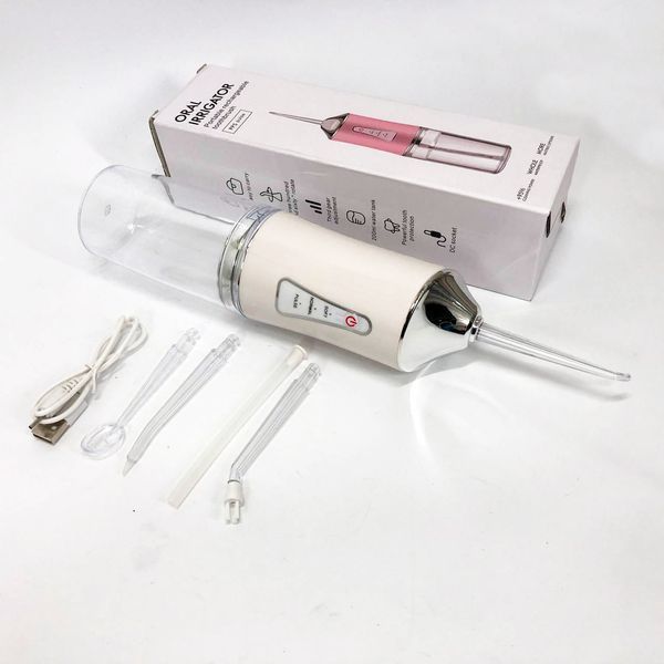 Іригатор для чищення зубів та порожнини рота Oral Irrigator з акумулятором та змінними насадками. Колір: білий ws12495 фото