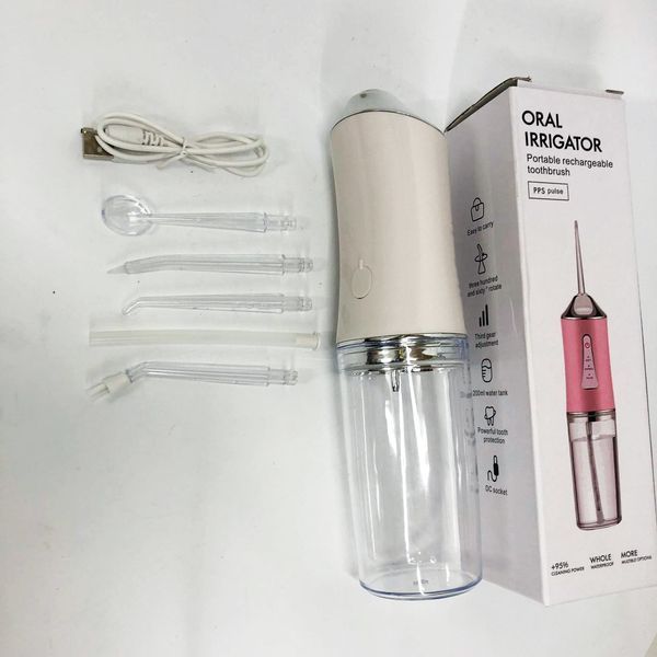 Іригатор для чищення зубів та порожнини рота Oral Irrigator з акумулятором та змінними насадками. Колір: білий ws12495 фото