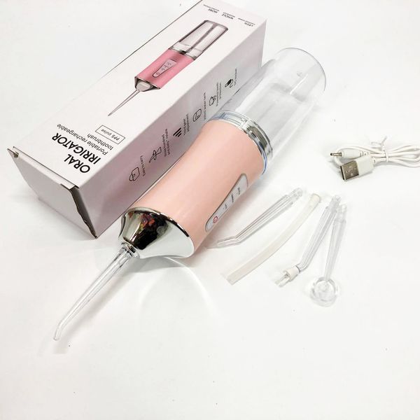 Ирригатор для чистки зубов и полости рта Oral Irrigator с аккумулятором и сменными насадками. Цвет: розовый ws12495-1 фото