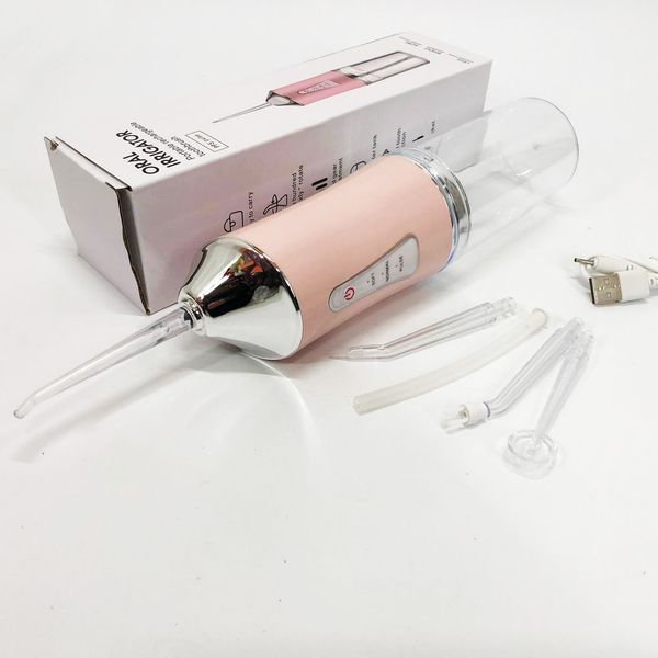 Ирригатор для чистки зубов и полости рта Oral Irrigator с аккумулятором и сменными насадками. Цвет: розовый ws12495-1 фото