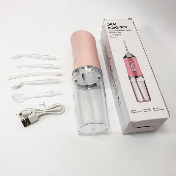 Ирригатор для чистки зубов и полости рта Oral Irrigator с аккумулятором и сменными насадками. Цвет: розовый ws12495-1 фото