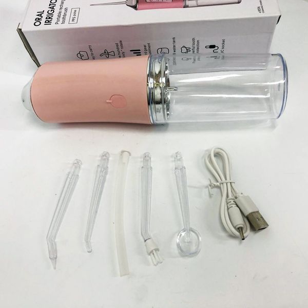 Ирригатор для чистки зубов и полости рта Oral Irrigator с аккумулятором и сменными насадками. Цвет: розовый ws12495-1 фото