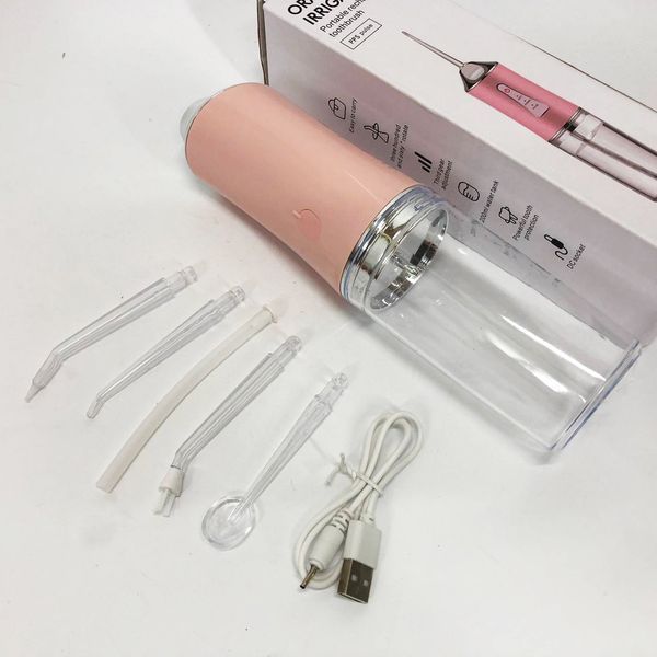 Ирригатор для чистки зубов и полости рта Oral Irrigator с аккумулятором и сменными насадками. Цвет: розовый ws12495-1 фото