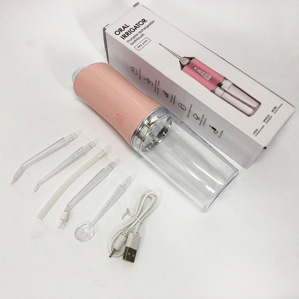 Ирригатор для чистки зубов и полости рта Oral Irrigator с аккумулятором и сменными насадками. Цвет: розовый ws12495-1 фото