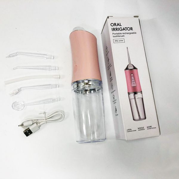 Ирригатор для чистки зубов и полости рта Oral Irrigator с аккумулятором и сменными насадками. Цвет: розовый ws12495-1 фото