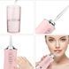 Ирригатор для чистки зубов и полости рта Oral Irrigator с аккумулятором и сменными насадками. Цвет: розовый ws12495-1 фото 4