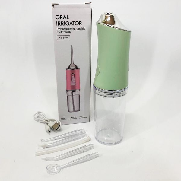 Ирригатор для чистки зубов и полости рта Oral Irrigator с аккумулятором и сменными насадками. Цвет: зеленый ws12495-2 фото
