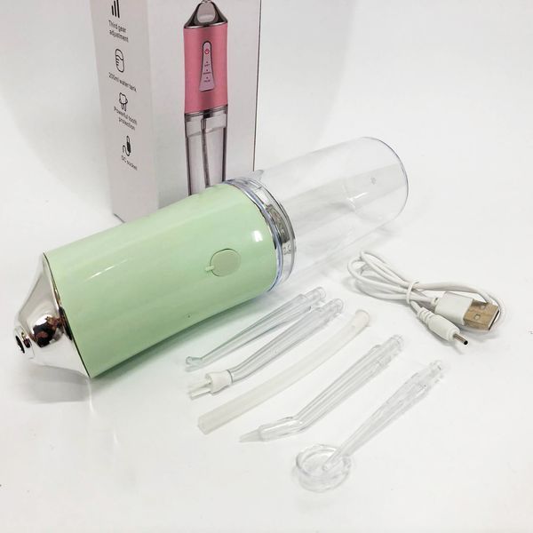 Ирригатор для чистки зубов и полости рта Oral Irrigator с аккумулятором и сменными насадками. Цвет: зеленый ws12495-2 фото