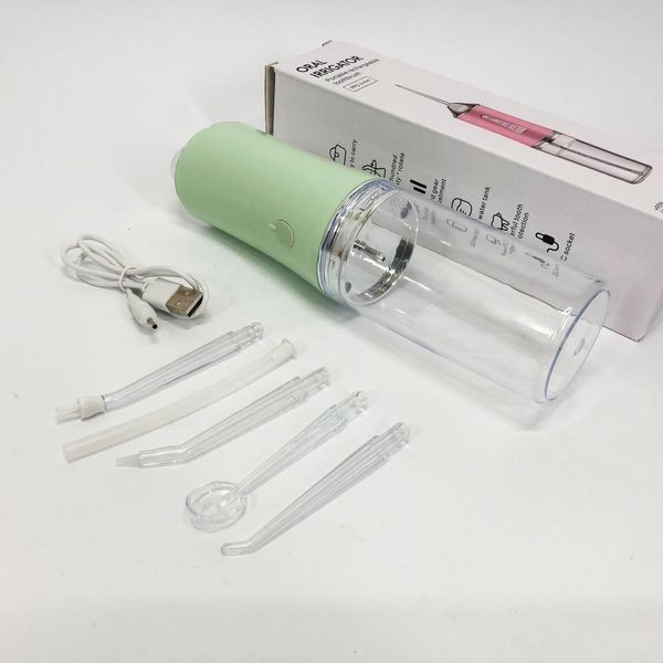 Ирригатор для чистки зубов и полости рта Oral Irrigator с аккумулятором и сменными насадками. Цвет: зеленый ws12495-2 фото