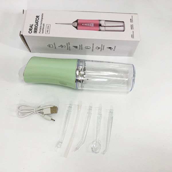Ирригатор для чистки зубов и полости рта Oral Irrigator с аккумулятором и сменными насадками. Цвет: зеленый ws12495-2 фото