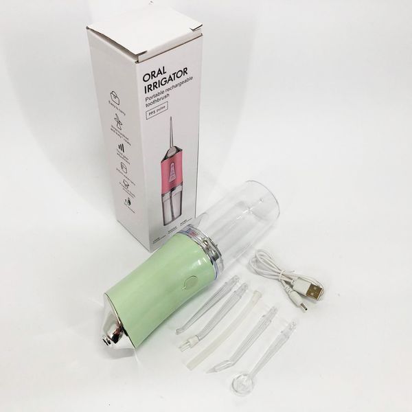 Ирригатор для чистки зубов и полости рта Oral Irrigator с аккумулятором и сменными насадками. Цвет: зеленый ws12495-2 фото