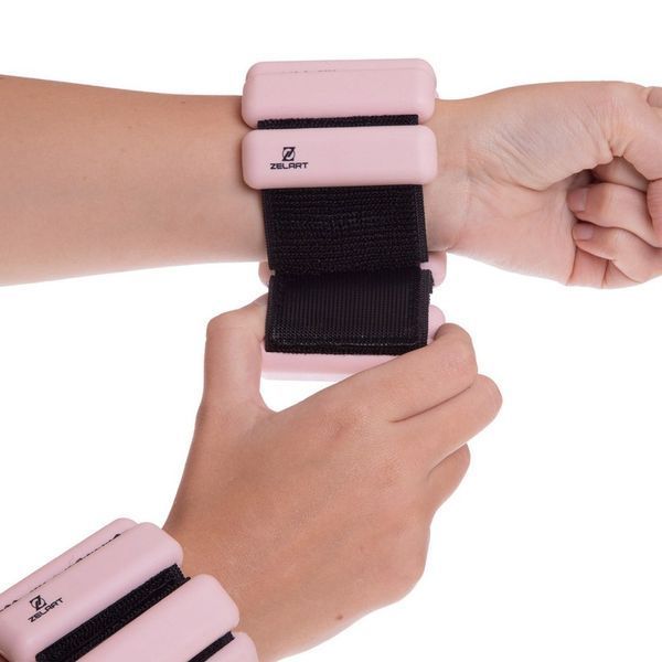 Обтяжувачі-браслети для рук ніг з силіконовим покриттям Zelart FITNESS BRACELETS TA-3274 2x0,5кг рожевий TA-3274 фото