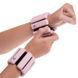 Обтяжувачі-браслети для рук ніг з силіконовим покриттям Zelart FITNESS BRACELETS TA-3274 2x0,5кг рожевий TA-3274 фото 7