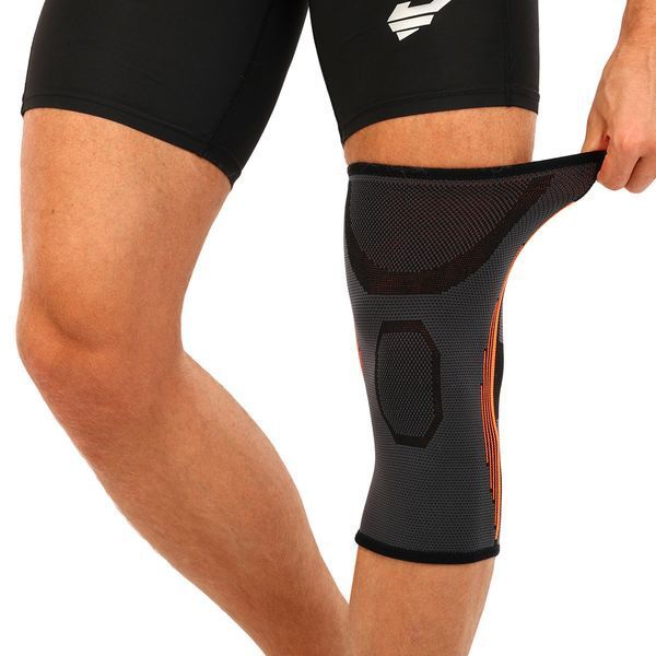 Наколенник спортивный эластичный компрессионный EXTREME 716CA S-L 1шт черный-оранжевый 716CA фото